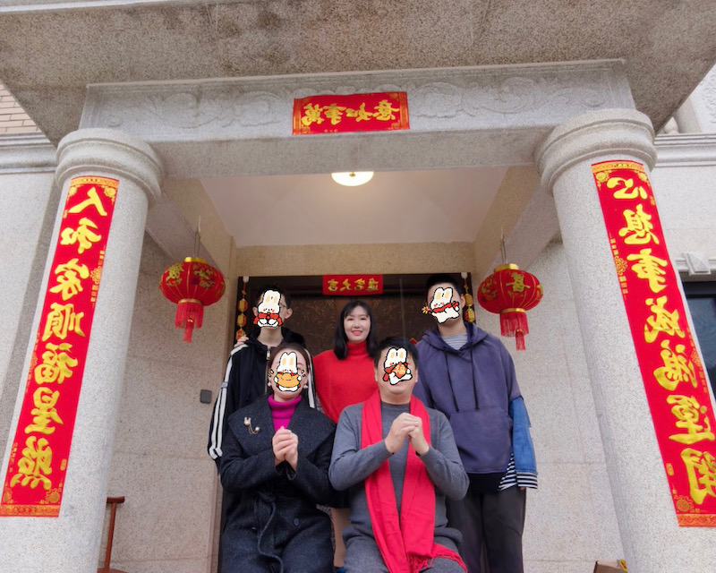 My family in front of our home last year on Chinese New Year